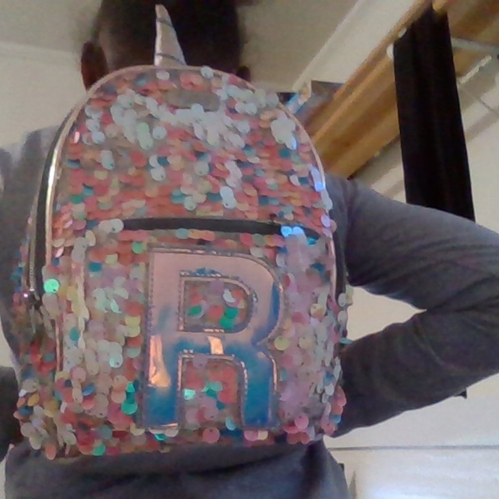 R justice backpack